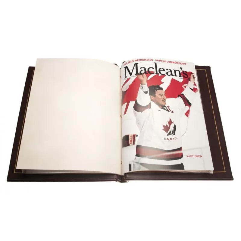 2002 $1 GOING FOR THE GOLD OLYMPIC 22KT GOLD-PLATED DOLLAR COIN WITH MAGAZINE AND 4-STAMP ALBUM SET
