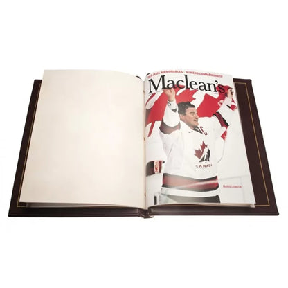 2002 $1 GOING FOR THE GOLD OLYMPIC 22KT GOLD-PLATED DOLLAR COIN WITH MAGAZINE AND 4-STAMP ALBUM SET
