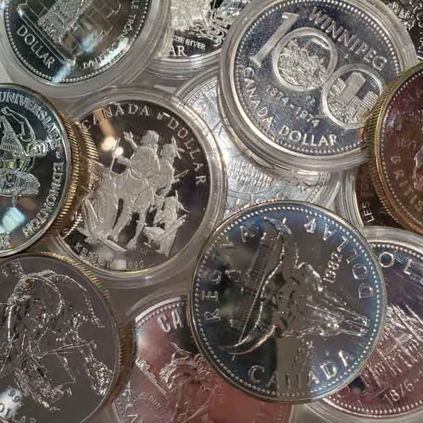 E-TRANSFER ONLY  100 MIXED CANADIAN SILVER DOLLARS (1971-1991) (3.75oz. SILVER)