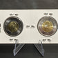 2026 50TH ANNIVERSARY OF THE CN TOWER CARDBOARD 2X2 COLOUR/NO COLOUR TOONIE (GLOW IN THE DARK) (2 PACK)