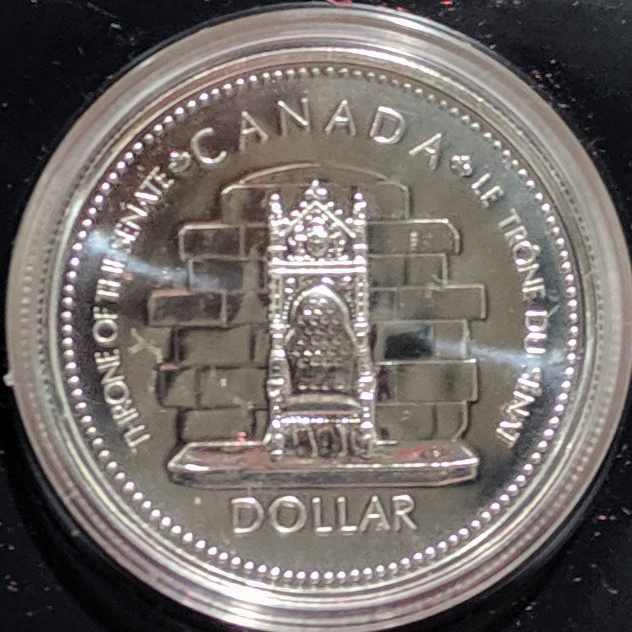 1977 SPECIMEN COMMEMORATIVE SILVER DOLLAR - 25TH ANNIVERSARY OF QUEENS ACCESSION