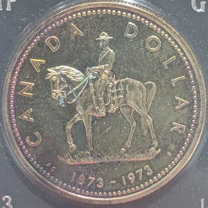 1973 SPECIMEN COMMEMORATIVE SILVER DOLLAR - ROYAL CANADIAN MOUNTED POLICE (TONED)