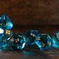 AQUAMARINE MULTIFACETED GLASS DICE SET
