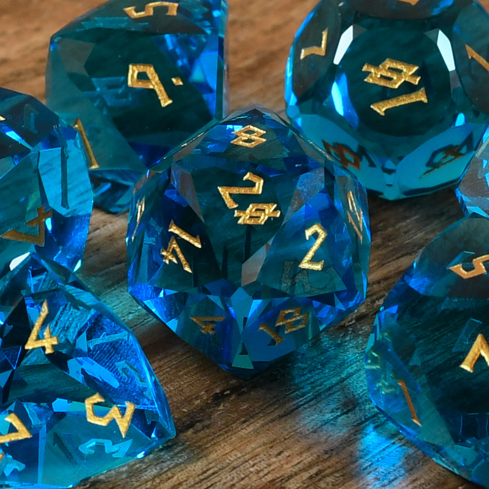 AQUAMARINE MULTIFACETED GLASS DICE SET