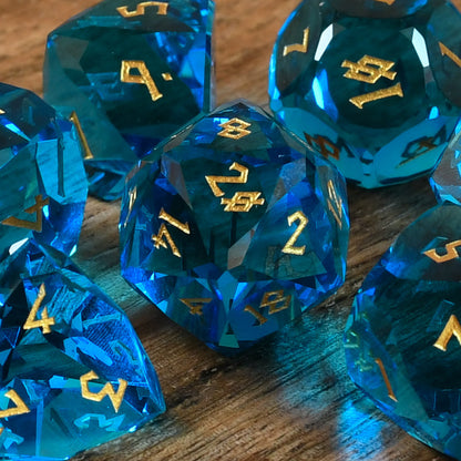 AQUAMARINE MULTIFACETED GLASS DICE SET