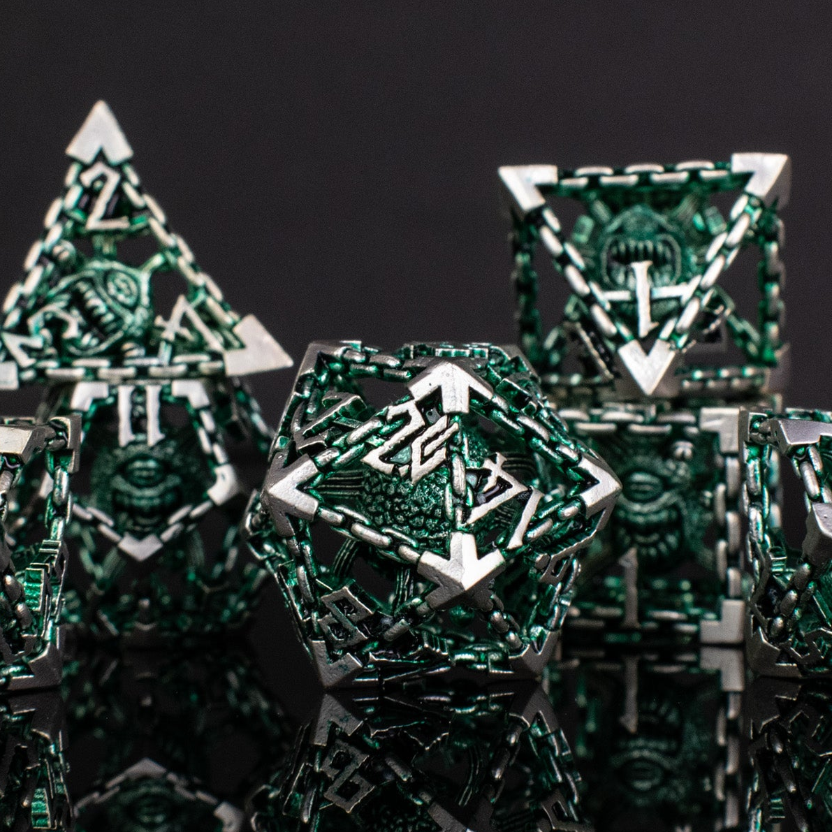 BEHOLDER'S GATES HOLLOW METAL DICE SET - GREEN AND SILVER