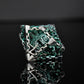 BEHOLDER'S GATES HOLLOW METAL DICE SET - GREEN AND SILVER