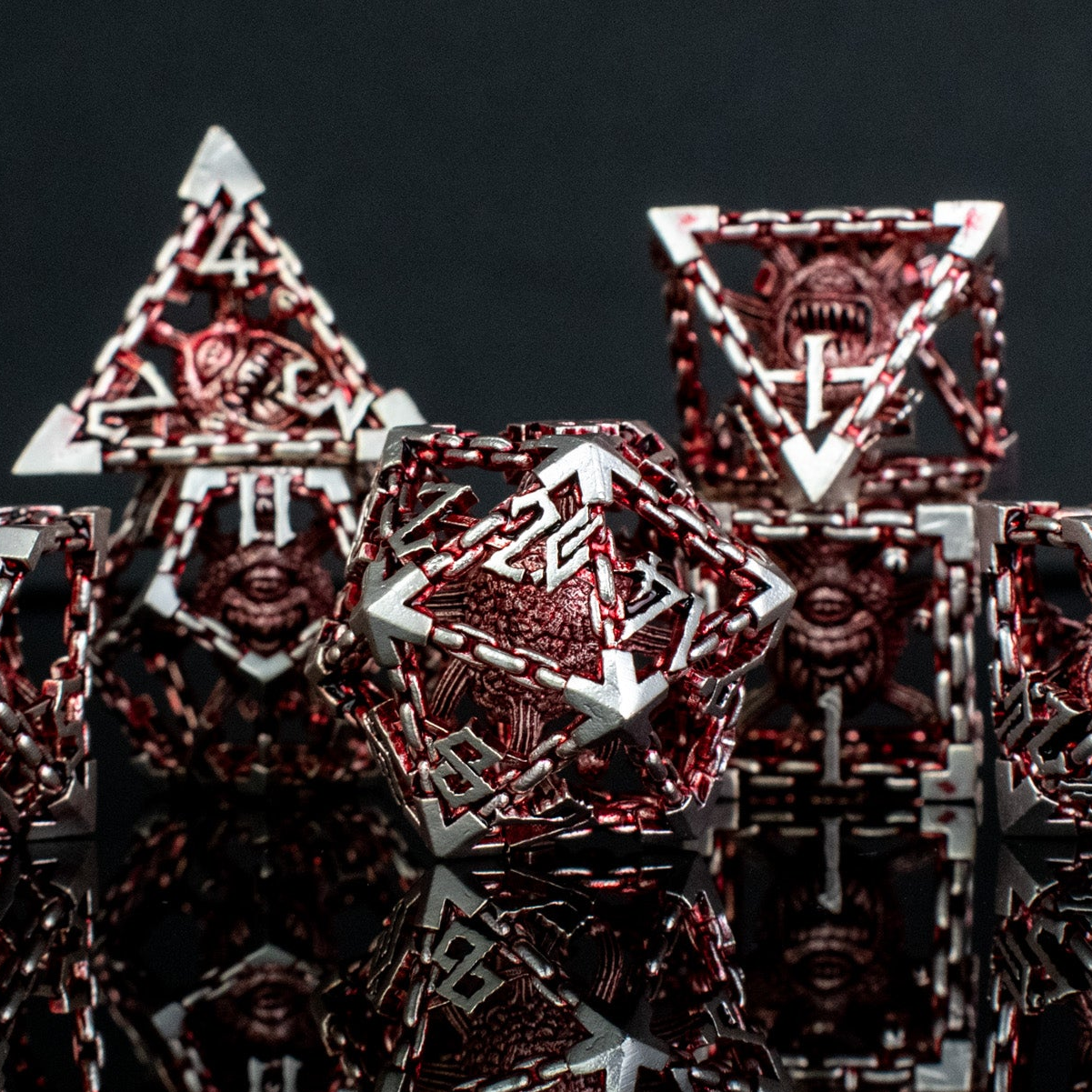 BEHOLDER'S GATES HOLLOW METAL DICE SET - RED AND SILVER