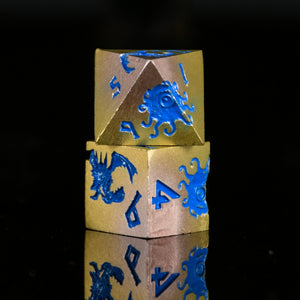 MONSTER MANUAL METAL DICE SET - BLUE AND GOLD