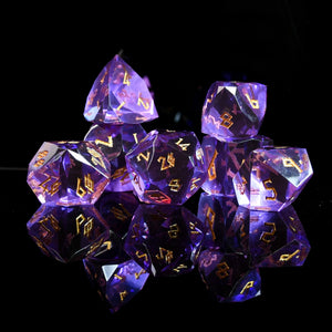 DEEP PLUM MULTIFACETED GLASS DICE SET