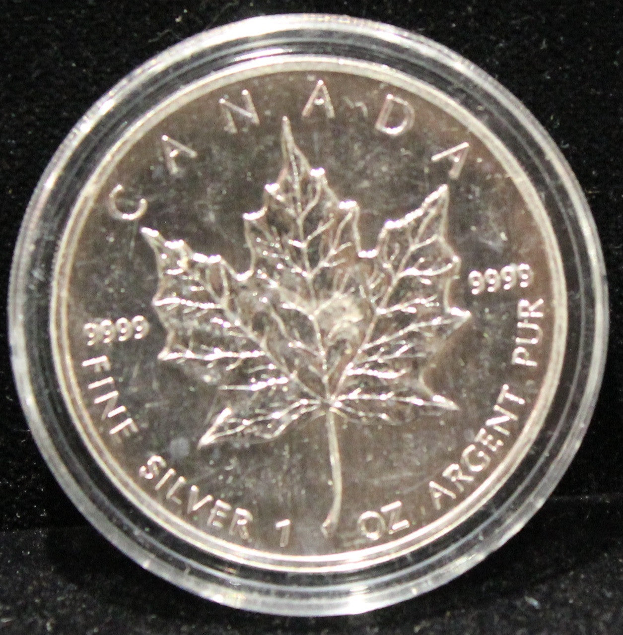 E-TRANSFER ONLY - 1oz. 1990 CANADIAN SILVER MAPLE LEAF COIN