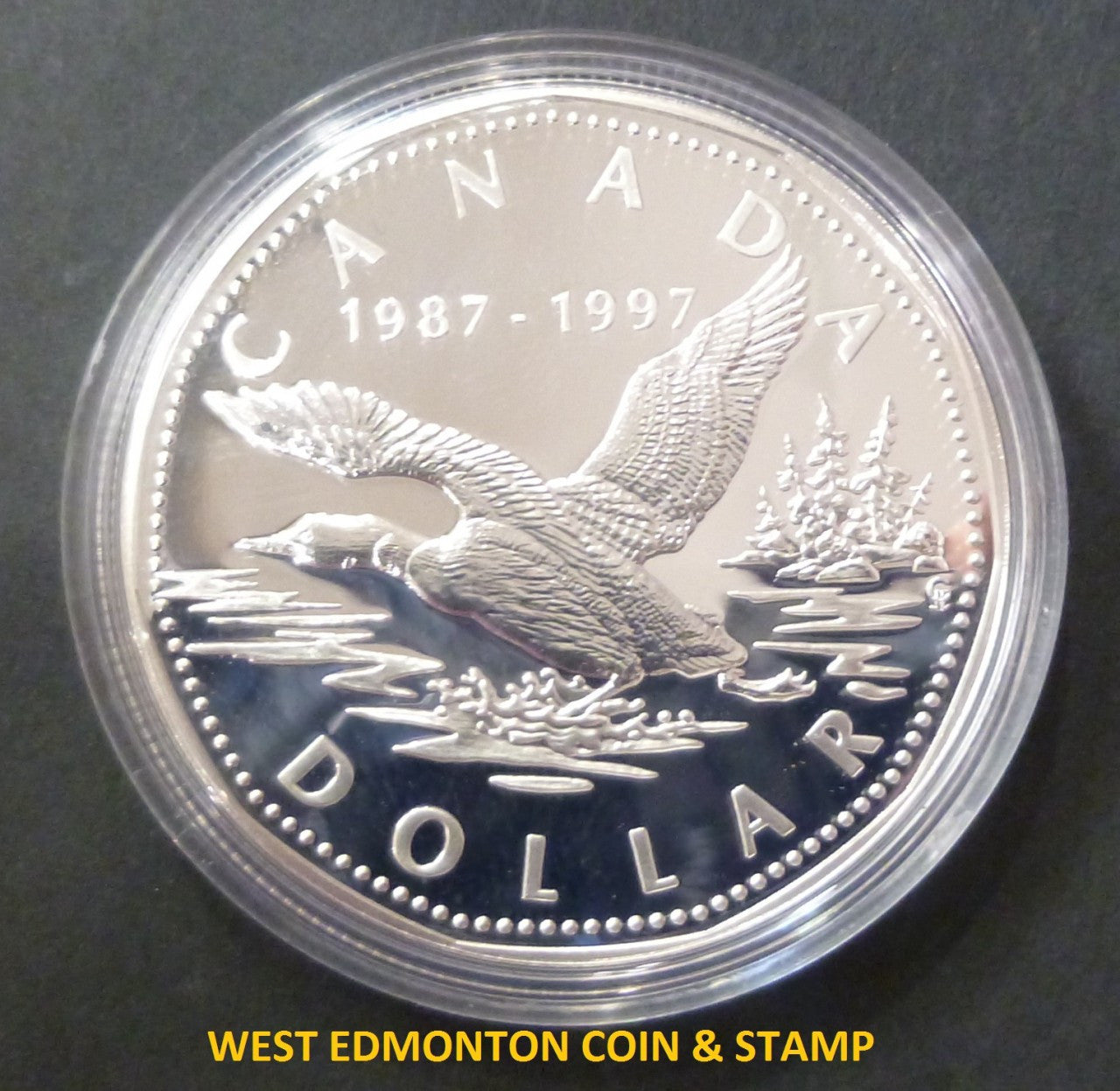 1997 PROOF SILVER DOLLAR WITH FLYING LOON 10TH ANNIVERSARY